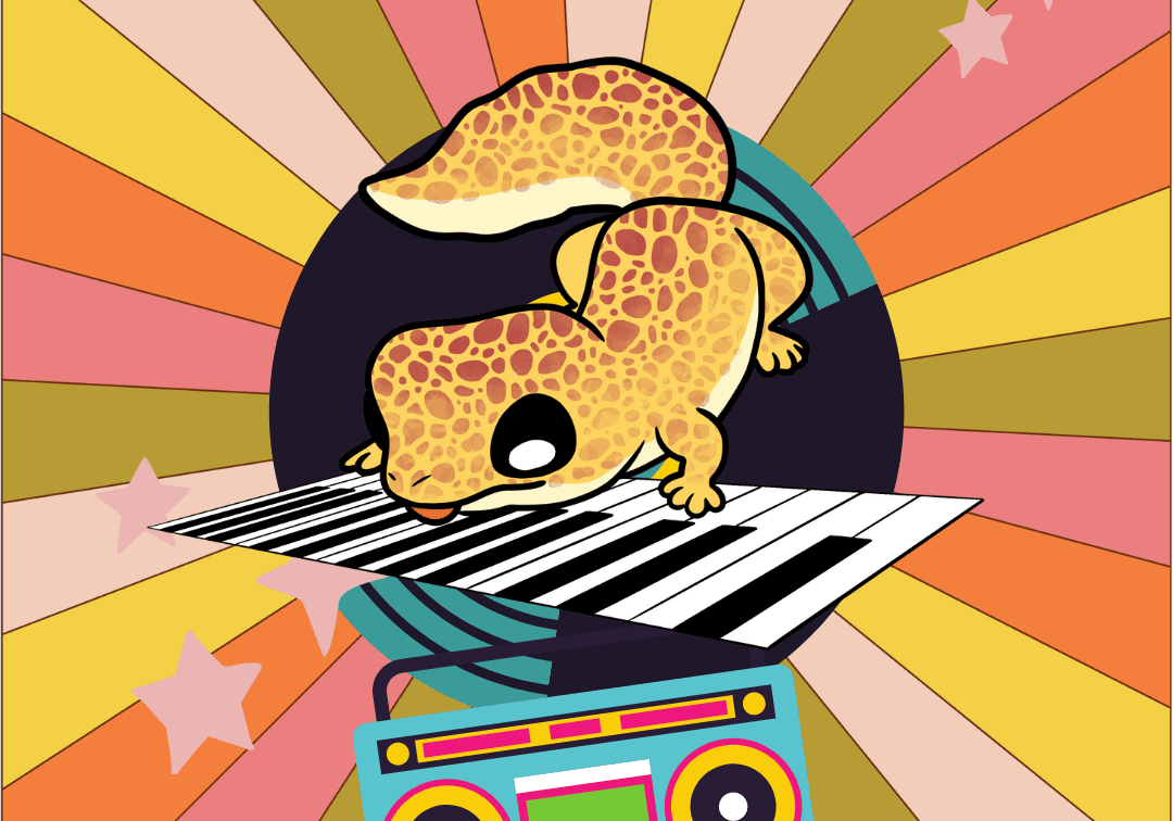 A lizard is playing the piano on a keyboard.